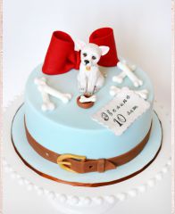 Детский торт "Белая собачка и красный бант"